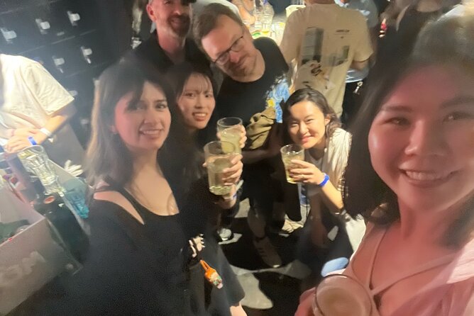 3Hour Osaka Pub Crawl Bar Hopping Nightlife Guided Tour in Namba - A standing okonomiyaki stop at Kanemasa Liquor Store