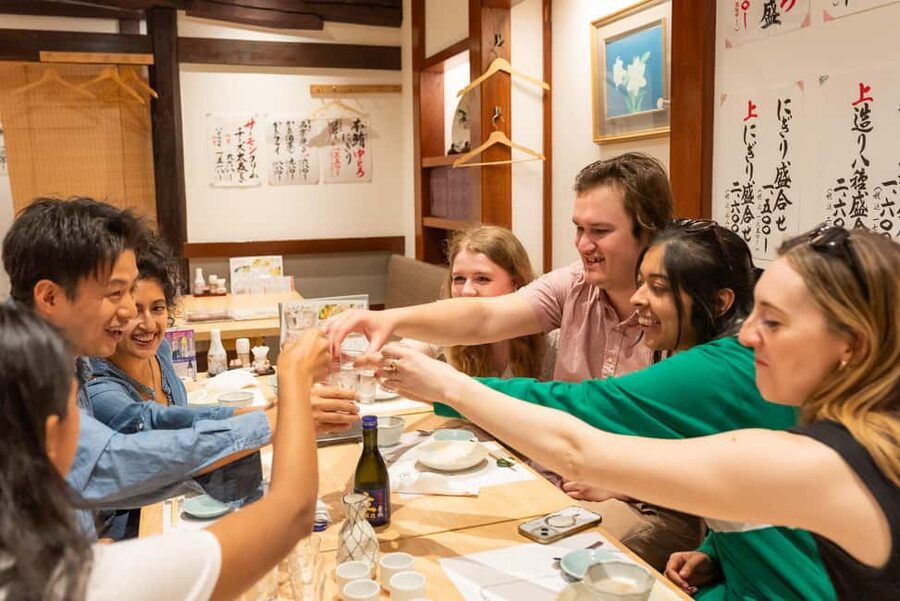 Eat Our Favorites! Osaka’s Backstreet Dining - Sushi at the counter, with sake on the side
