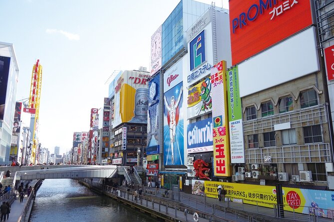 Full Day Guided Tour in Osaka by Van - Dotonbori brings food, lights, and Hozenji Temple