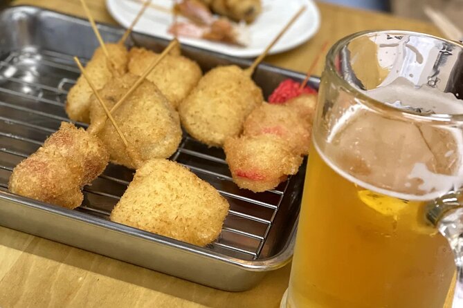 Hidden Osaka - Yukaku Red Light Tour & Culinary Adventure - Shinsekai and the old Luna Park atmosphere