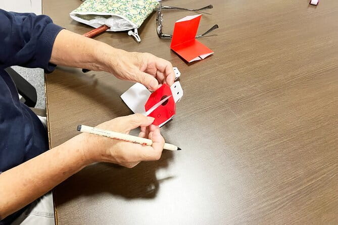 Japanese miniature kimono made with origami in Osaka - Folding a kimono from a single sheet