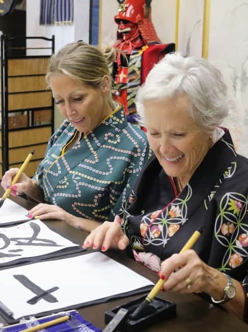 Learning Shodo with a kimono and Trying Samurai Calligraphy - A good family activity, with a few limits