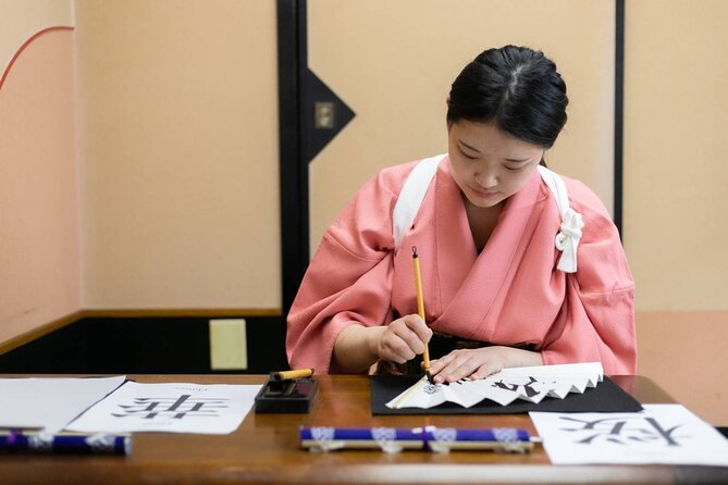 Learning Zen of Japanese Calligraphy in kimono near Osaka Castle - Why this works well after Osaka Castle