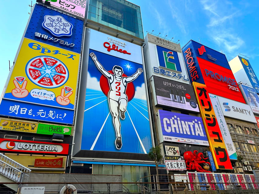 Osaka: 1-Day Guided Tour - Sky Bldg, Castle, Namba Shinsekai - Osaka Castle and the main tower