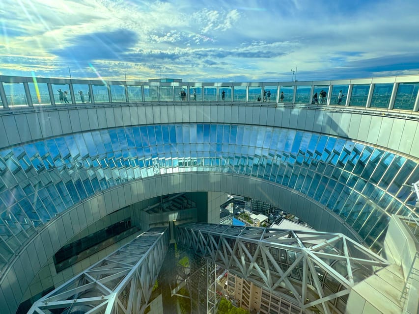 Osaka: 1-Day Guided Tour - Sky Bldg, Castle, Namba Shinsekai - What the guide adds to the day