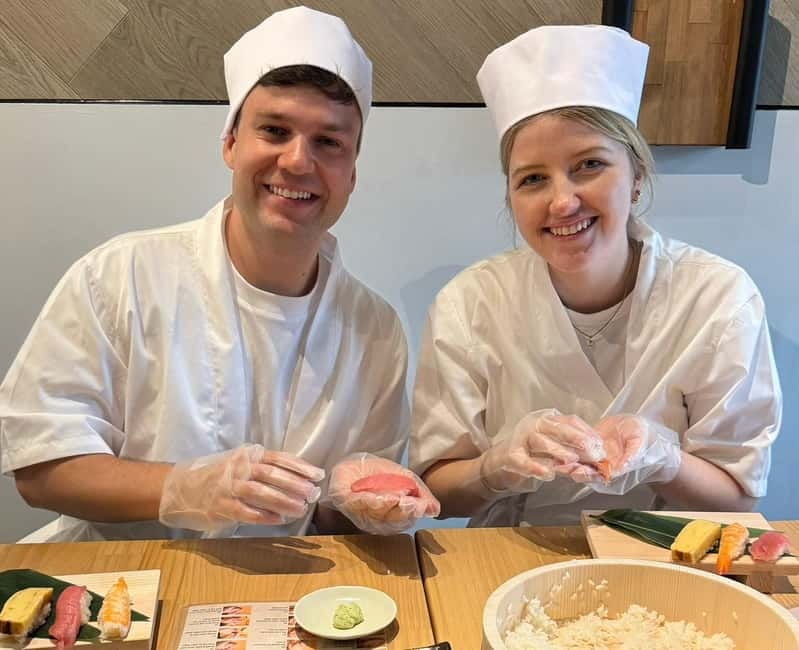 Osaka Dotonbori: Sushi Making Experience - Step two: adding neta, wasabi, and the topping