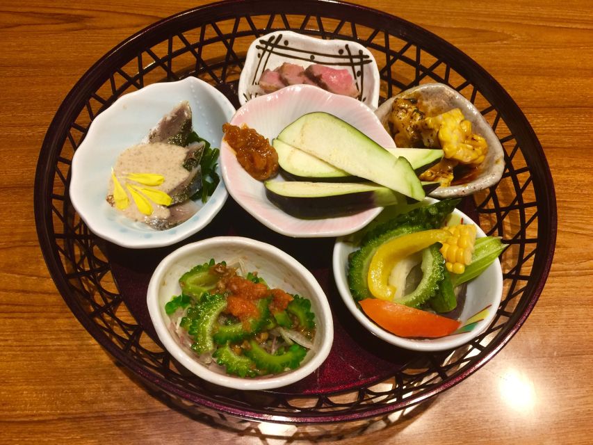 Osaka: Food Tour at Night with Tastings - Four food stops, one drink, and dessert