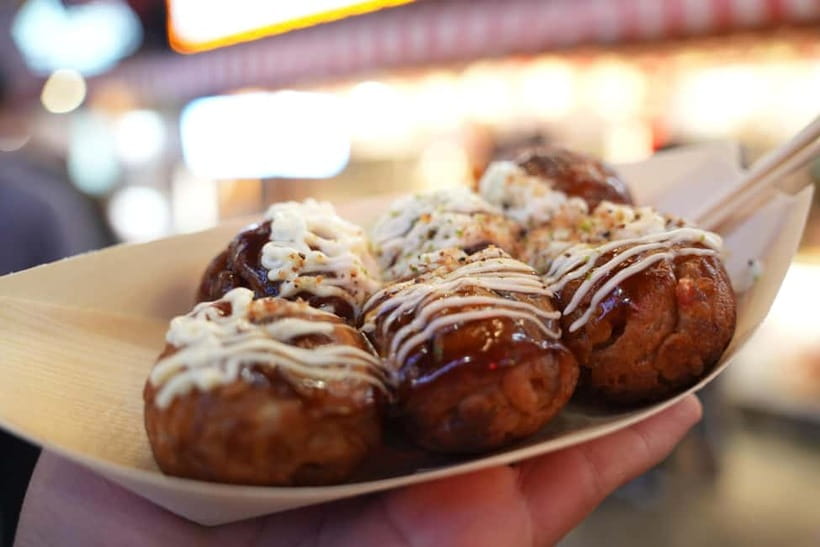 Osaka: Food Tour Kuromon Market & Dotonbori with Guide - Custard tart for a sweet finish
