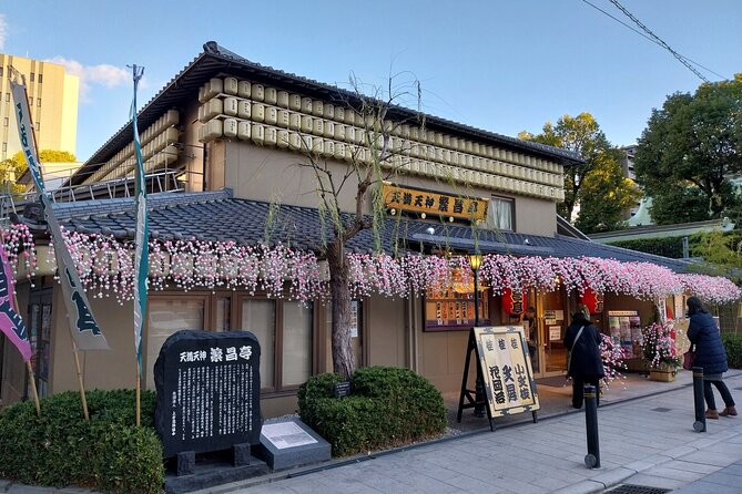 Osaka Food Tour with 10 Classic Japanese Tastings & Drinks - Udon, takoyaki, and the tour’s changing menu