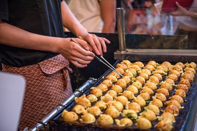 Osaka Highlights Walking Tour: Castle, Dotonbori & Hidden Gems - Dotonbori delivers Osaka in bright colors