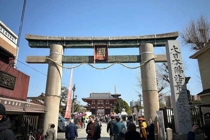 Osaka Highlights Walking Tour: Castle, Dotonbori & Hidden Gems - Hozenji Yokocho brings a quieter mood