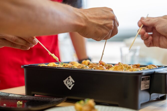 Osaka Home Feast Cooking and Sake Experience - Cooking Osaka dishes in a cozy studio