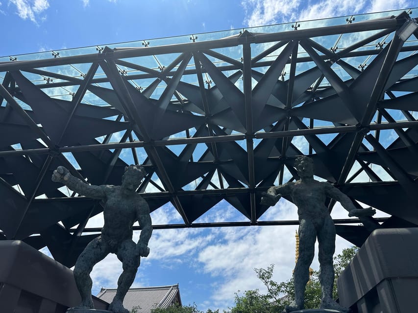 Osaka: Japan’s Oldest Temple & Bone Buddha Walking Tour - Isshinji’s modern gate and old religious purpose