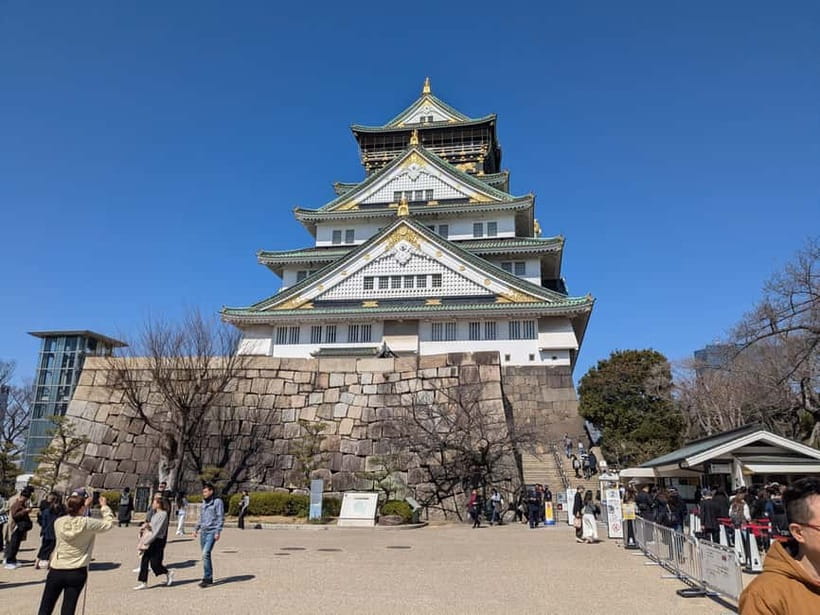 Osaka: Osaka Castle Guided Tour with Local Guide - Walking the stone walls and historic grounds