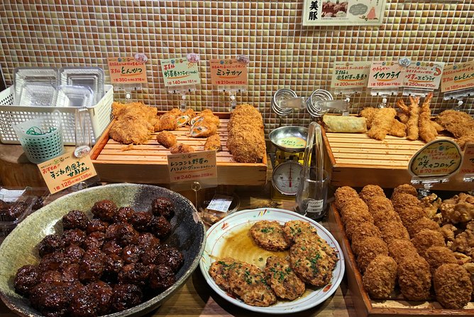 Osaka Private Food Tours by Local Foodies: 100% Personalized - Eating beneath the Dotonbori neon