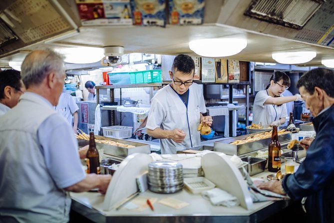 Osaka Private Food Tours by Local Foodies: 100% Personalized - Starting at Dotonbori’s food-filled crossroads