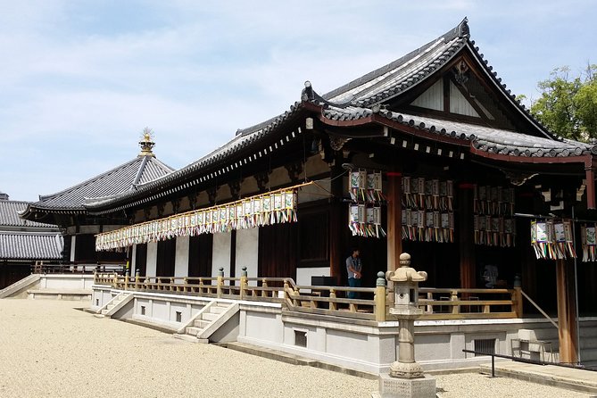 Osaka’s Best and Brightest: Private Full-Day Tour by Vehicle - Shinsekai shows Osaka’s eccentric side