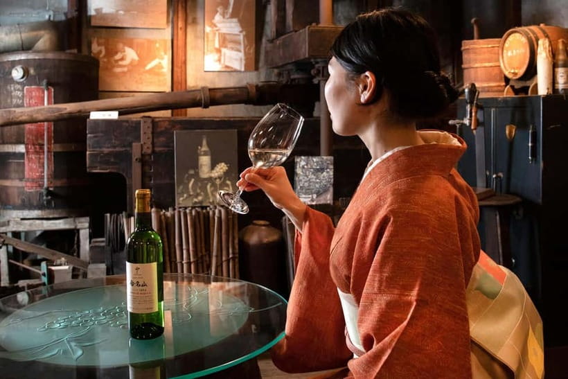 Osaka Winery Tour with Wine Tasting & Vineyard Walk - Entering a winery founded in 1914