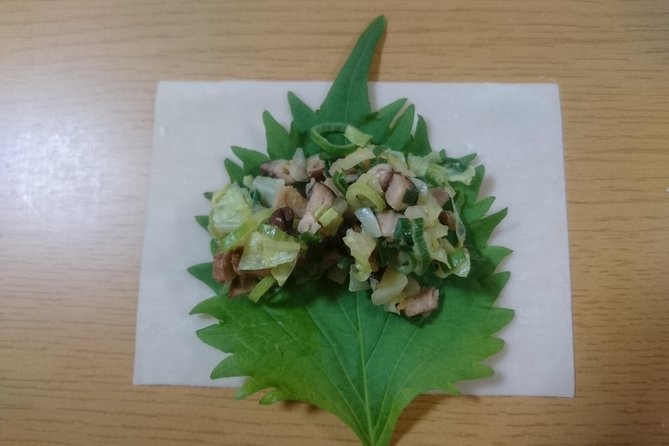 Ramen and Gyoza Cooking Class in Osaka - Folding two kinds of gyoza