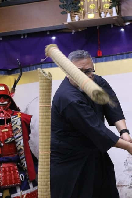 Samurai Armor & Sword experience with phot near Osaka Castle - Beginning with a bow before the shrine