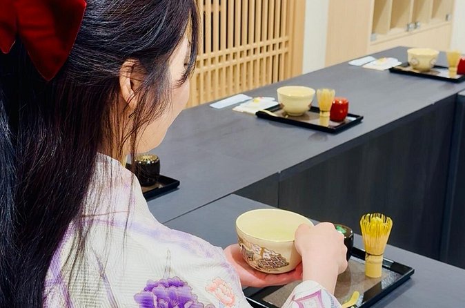 Tea and Calligraphy Session at a Table in Osaka - The staff make the short format work