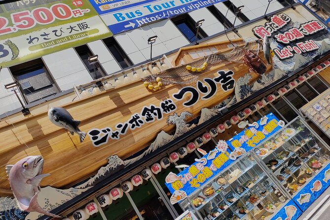 Ultimate Osaka Walking Tour: Castle, Dotonbori & Hidden Gems - Dotonbori, neon, and the food center of Osaka