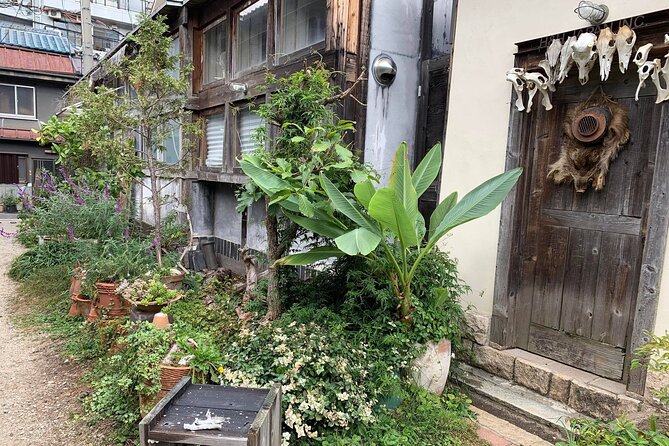 Urban Canvas: Osaka Street Art Bike Tour - Crossing the Yodo River toward Juso